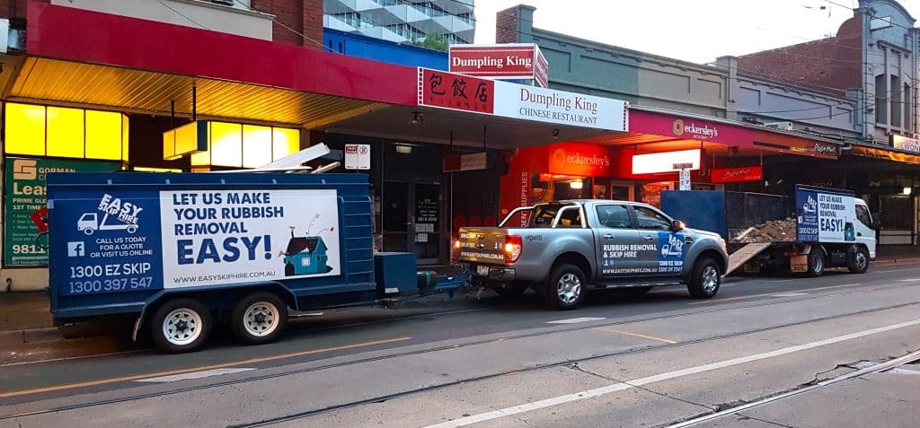 trailer and ute on street