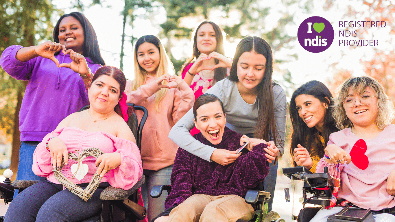 NDIS Clients and Carers giving heart sign